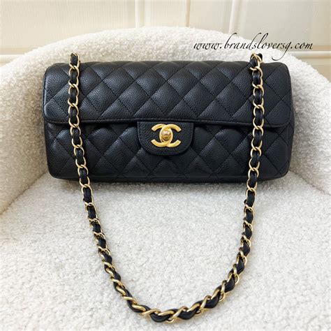 help!!! Chanel east west flap or WOC (both black caviar